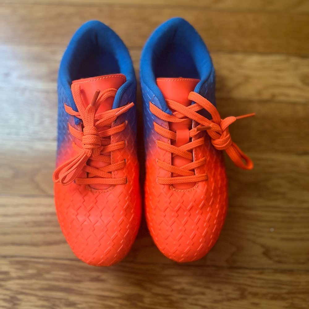 Kids' Orange and Blue Cleats and Green and blue shin guards